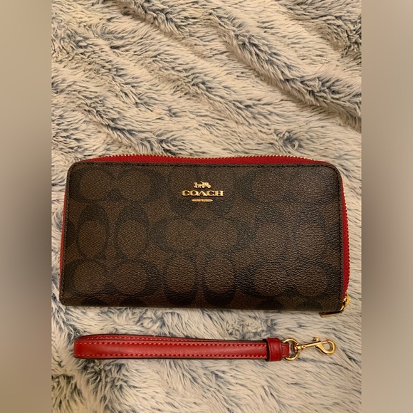 Coach Handbags - ✨ NWT Long Zip Around Wallet In Signature Canvas✨